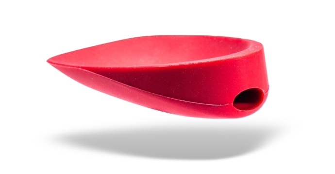 Red silicone component with a smooth surface and an open hole, manufactured by Albright Silicone, a division of EPTAM