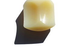 Machined plastic component for orthopedic joint replacement with smooth, precise contours
