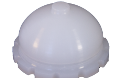 Machined White Plastic Acetabular cup (socket) for orthopedic implants, showcasing outer surface
