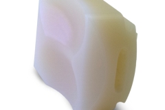 Orthopedic joint replacement component machined from UHMWPE, used in knee implant systems, with smooth contours