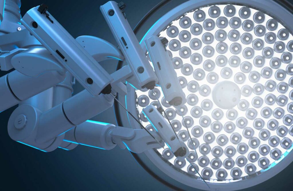 Surgical robotic arms under bright LED lights, showcasing precision and advanced technology in robotic-assisted surgery